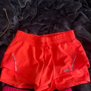 Running shorts with spandex, neon orange and pink, lightweight, Avia